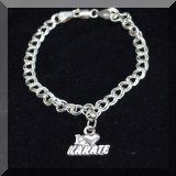 J07. Sterling silver bracelet with ”I love karate” charm. 6.5” - $18 